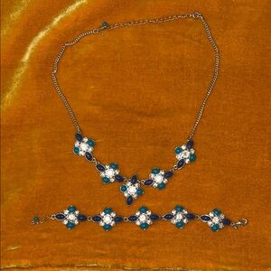 Beautiful statement necklace with matching bracelet blue teal green